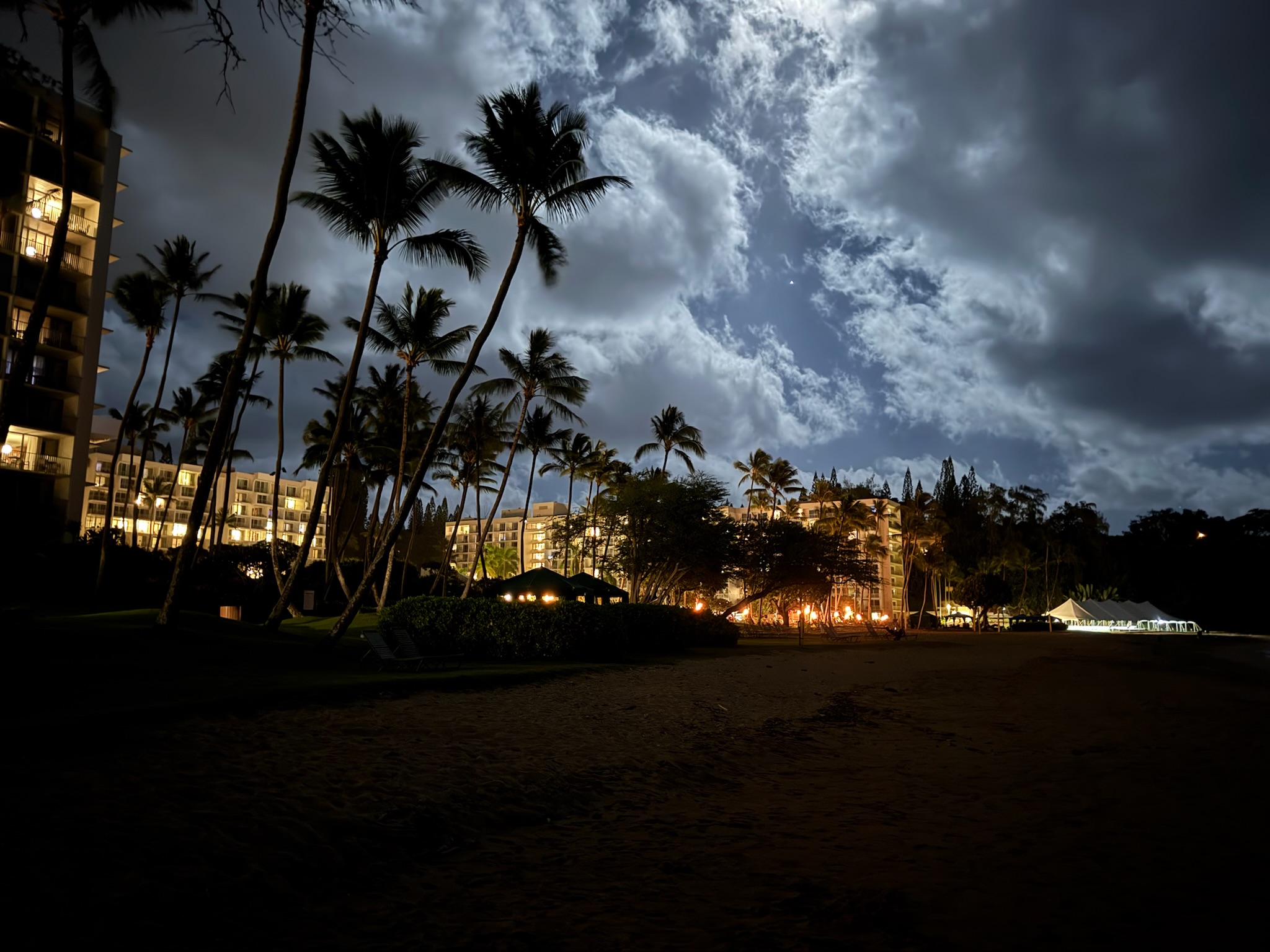 Nighttime view of Kauai Marriott Resort and Spa’s beautifully lit exterior.